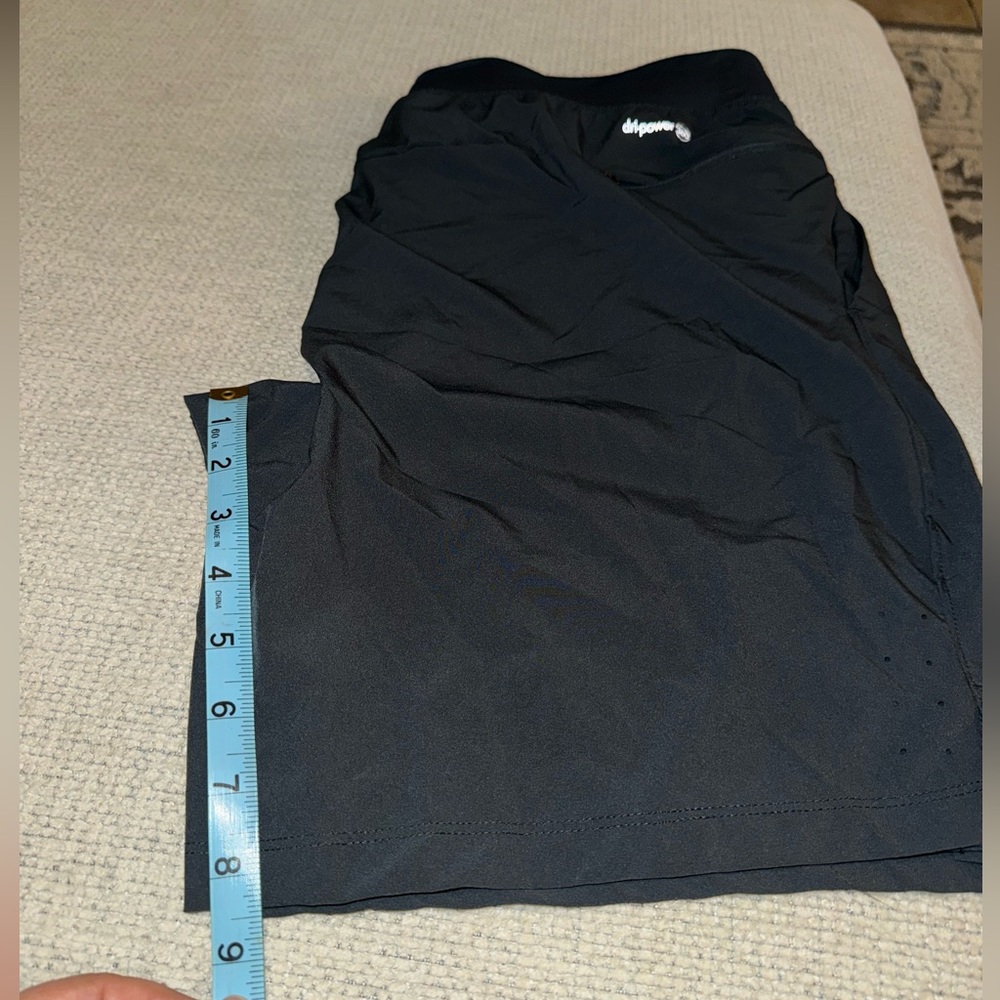 This is a set - Buyjya athletic shorts in black and athletic shirt in white.